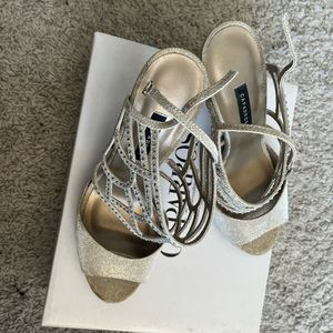 Heels for dance or formal wear. Not super high. Only worn once.